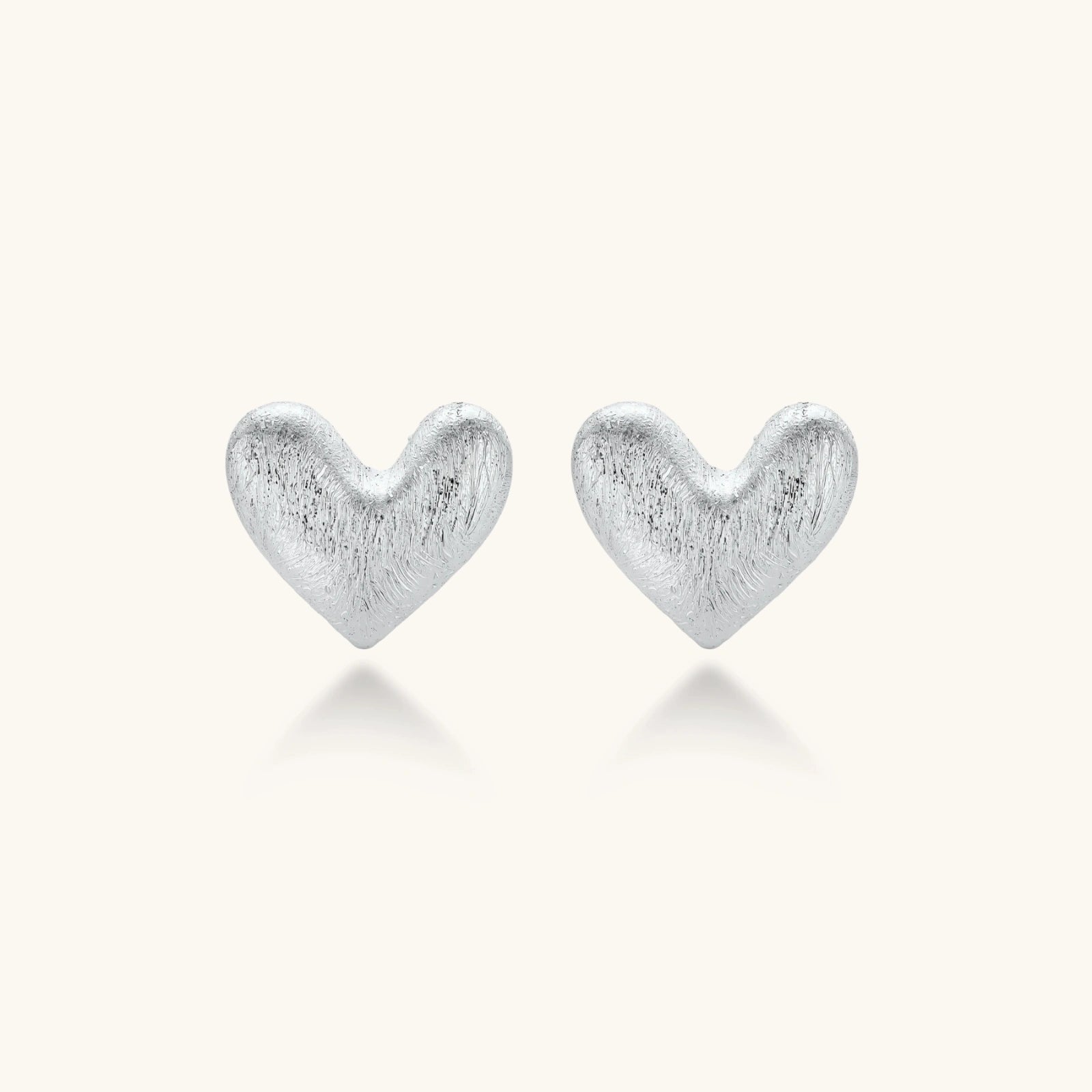 Heart Glow Studs by Sieré