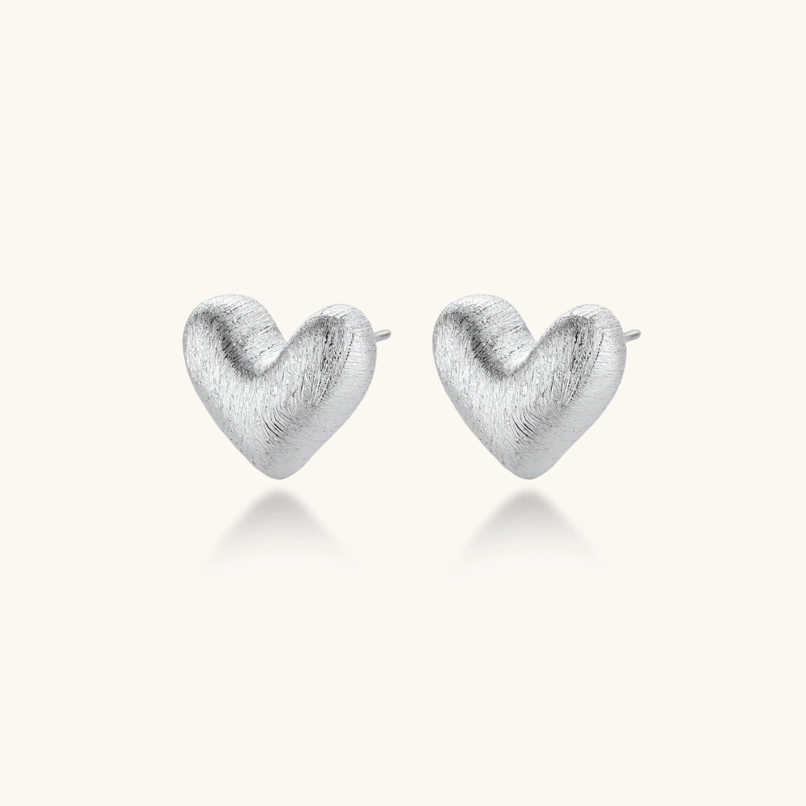 Heart Glow Studs by Sieré