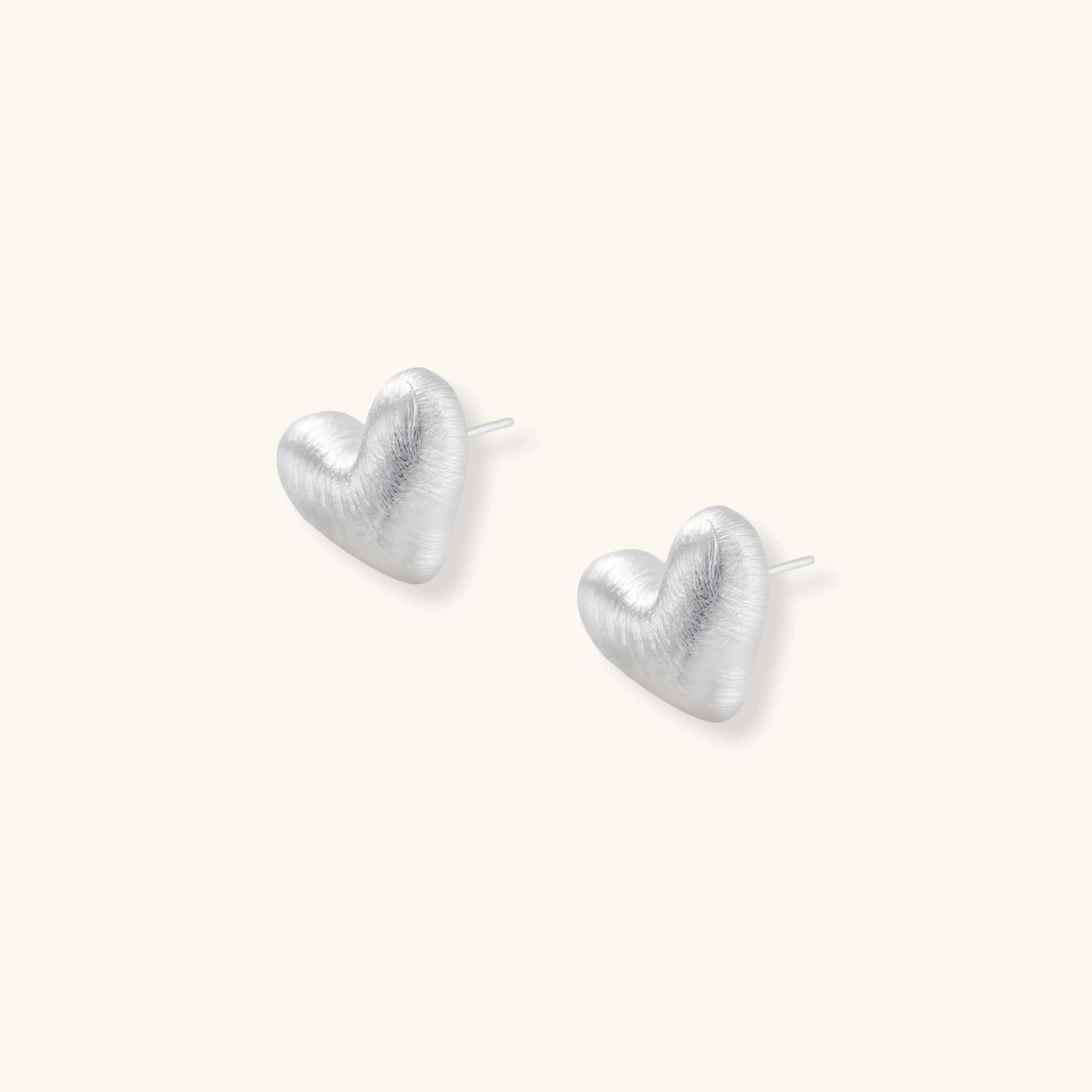 Heart Glow Studs by Sieré