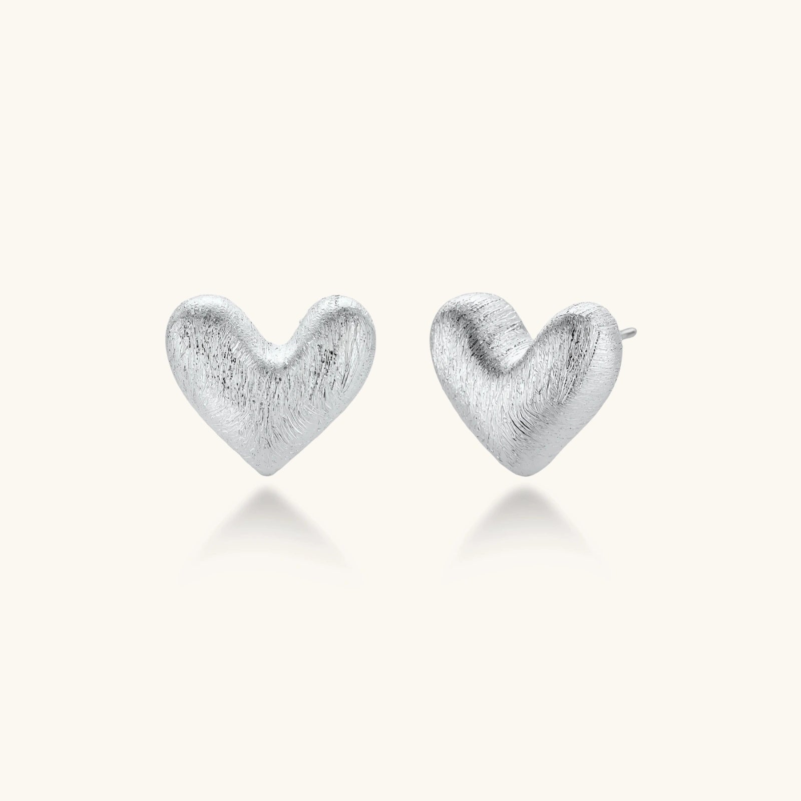 Heart Glow Studs by Sieré