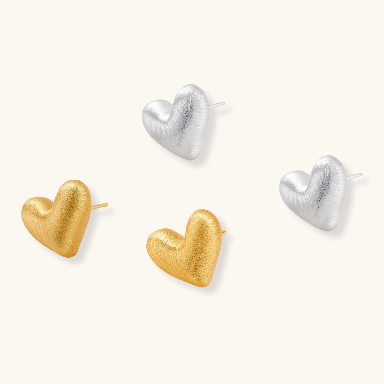 Heart Glow Studs by Sieré