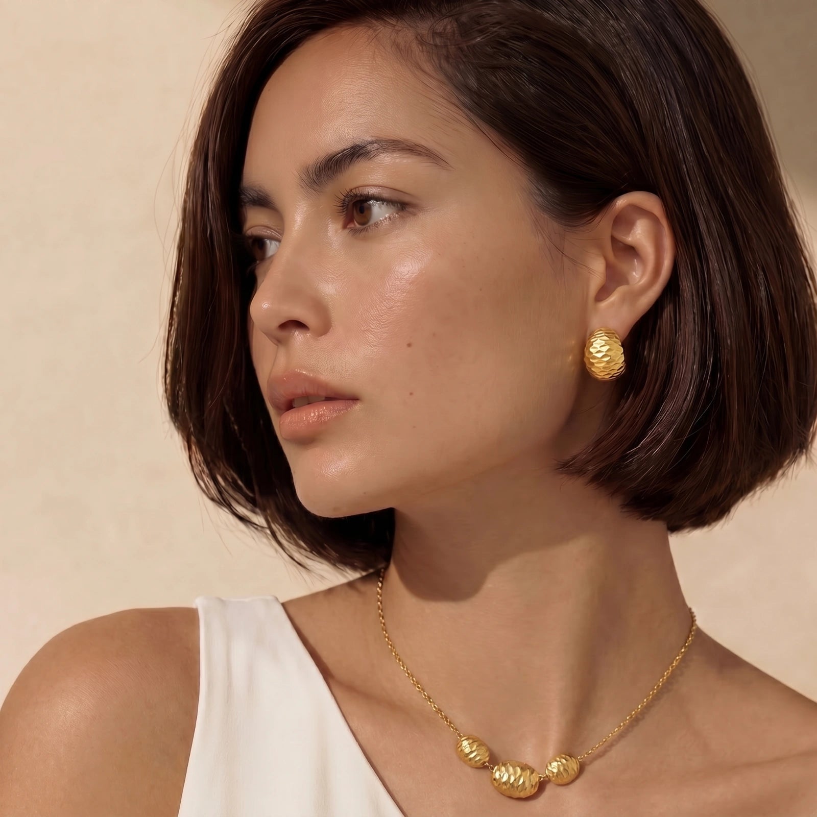 Hammered Gold Huggies by Sieré
